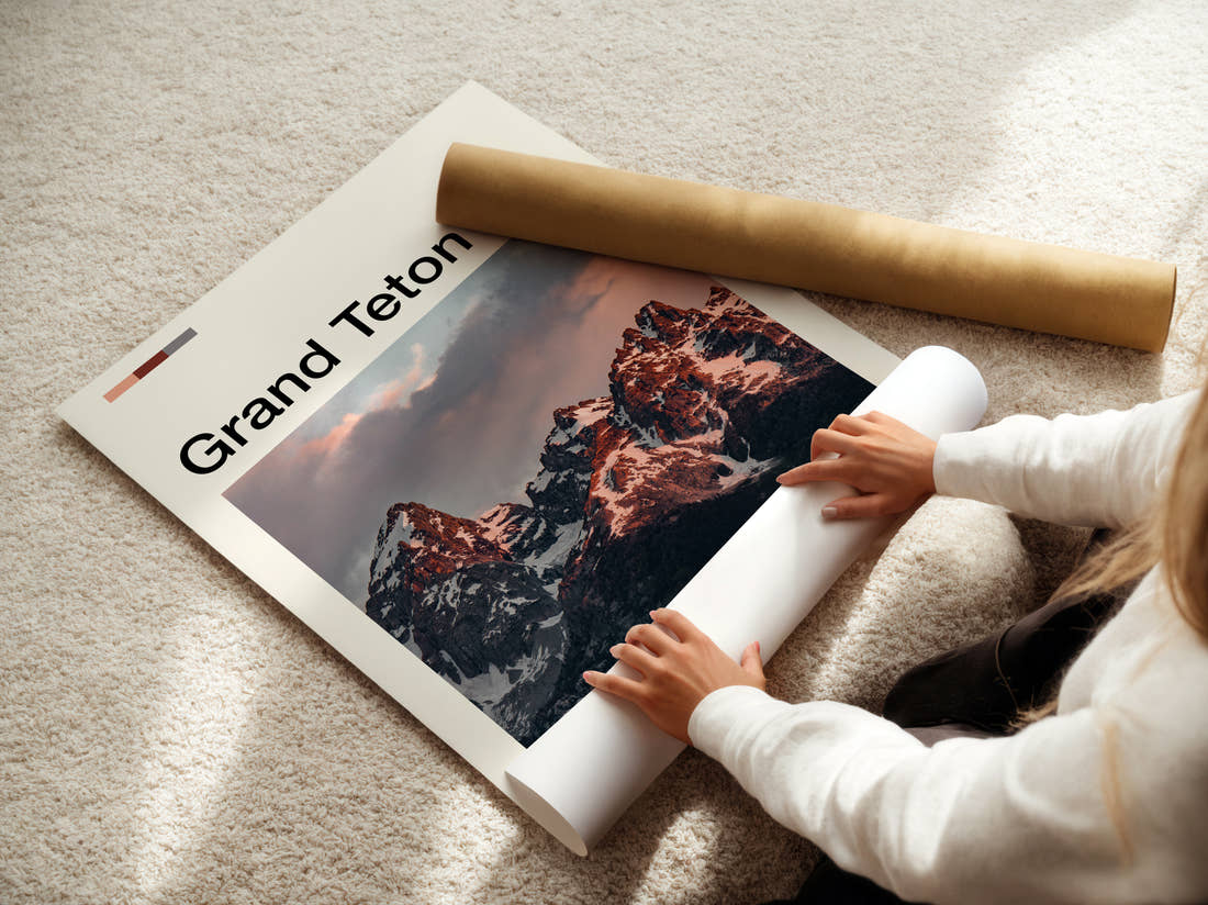 Grand Teton Jagged Snowy Peaks Travel Print being unrolled from its postal tube