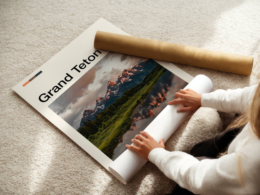 Grand Teton Mountains Reflected In River Travel Print being unrolled from its postal tube
