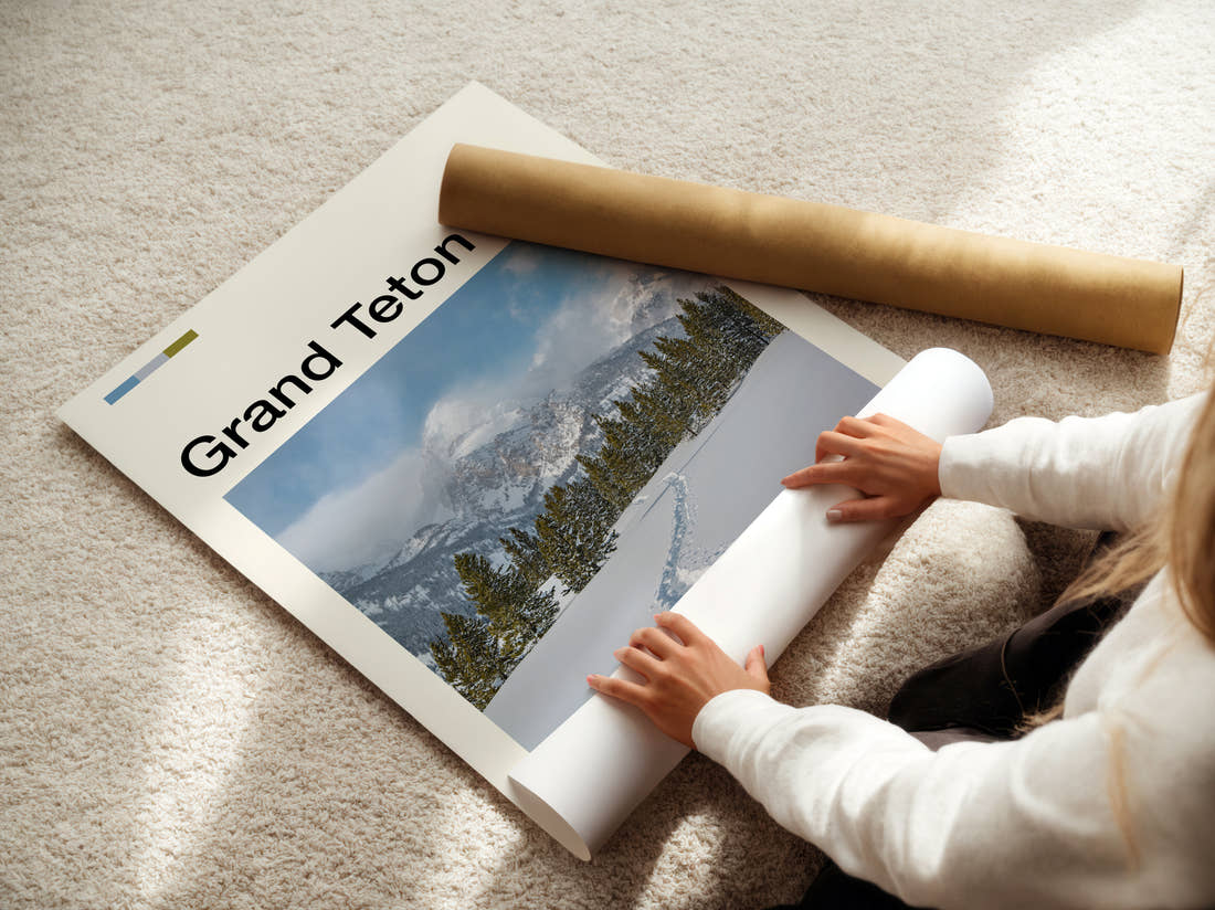 Grand Teton Snowy Trail And Peaks Travel Print being unrolled from its postal tube