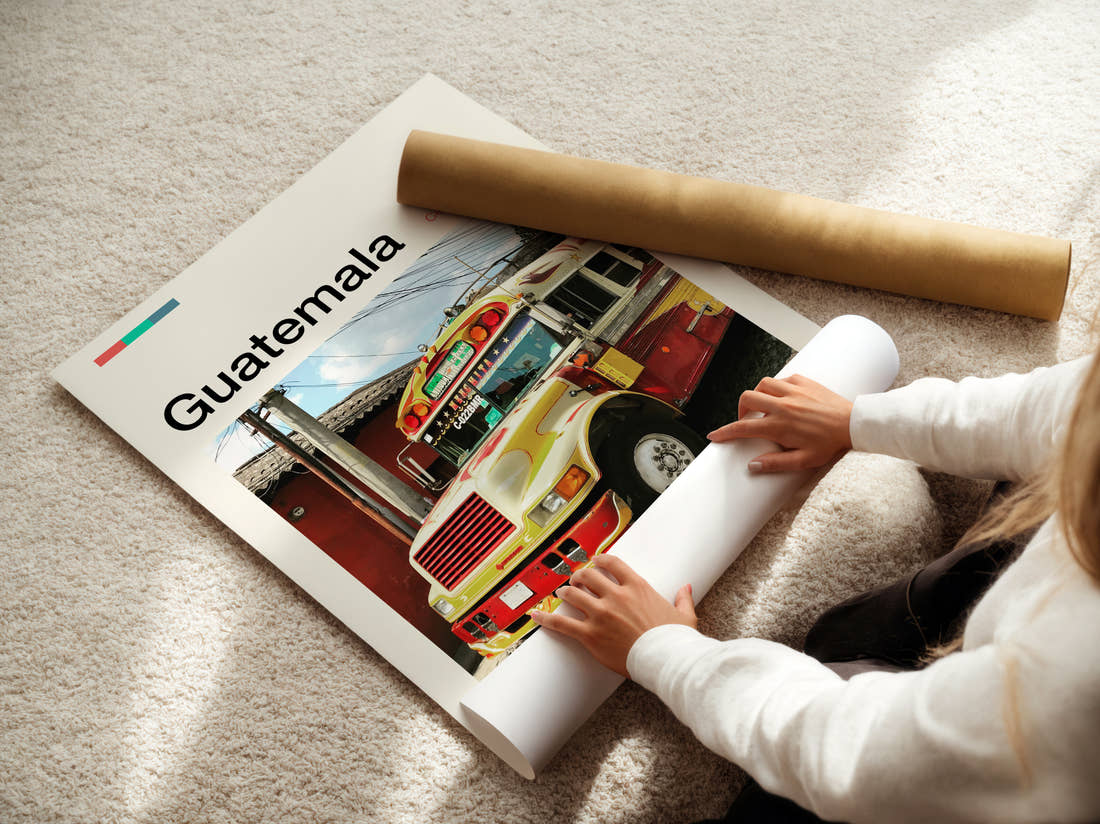 Guatemala Colourful Chicken Bus Travel Print being unrolled from its postal tube