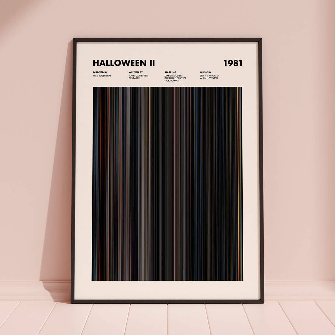 Halloween II Movie Barcode Poster framed and leaning against a coloured wall
