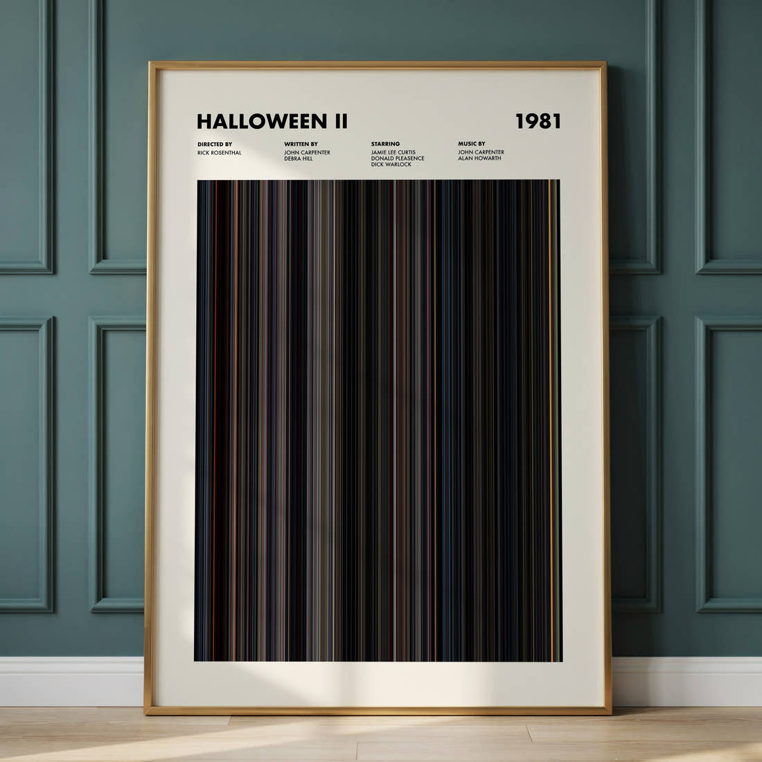 Halloween II Movie Barcode Poster framed and leaning against a panelled wall