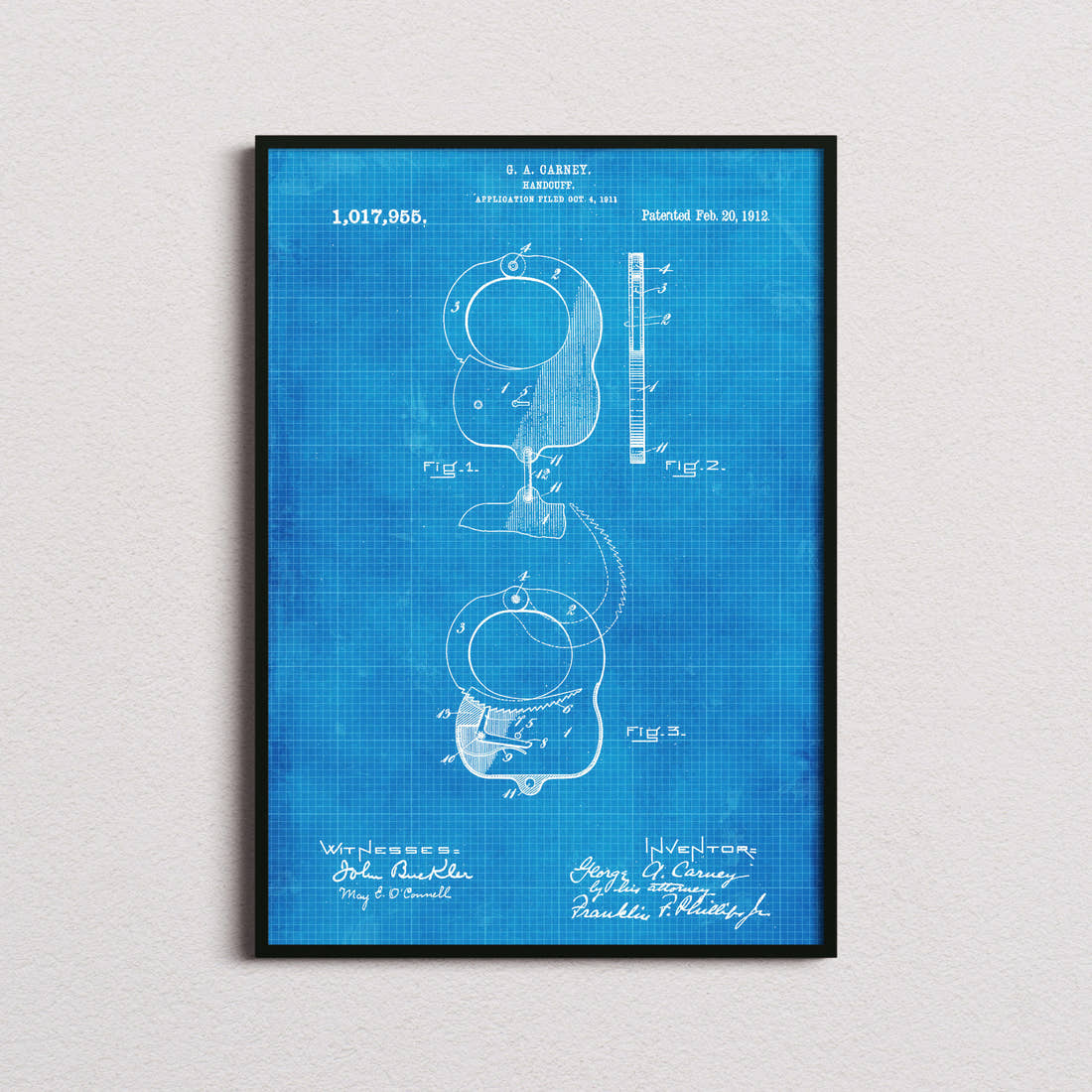 Handcuffs Patent Print in the blueprint colourway, framed