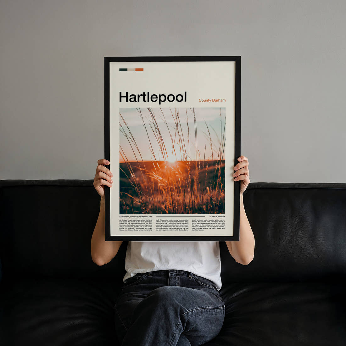 Hartlepool Golden Grass Sunset Travel Print held up by hand to show the size of the print