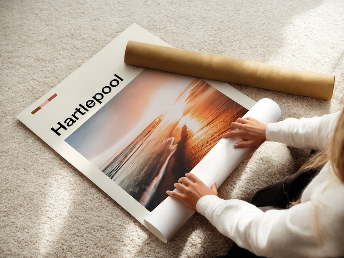 Hartlepool Golden Sunset Shoreline Travel Print being unrolled from its postal tube