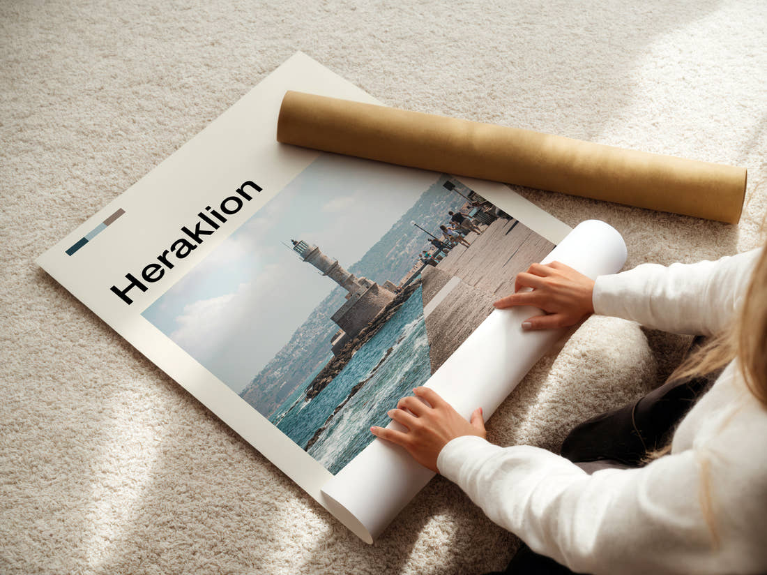 Heraklion Lighthouse On The Pier Travel Print being unrolled from its postal tube
