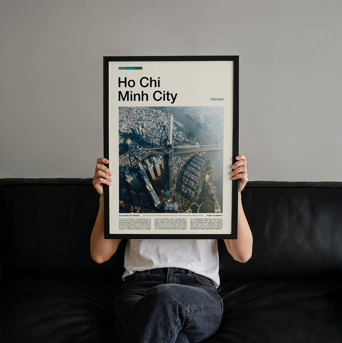Ho Chi Minh City Aerial View Of The City Travel Print held up by hand to show the size of the print