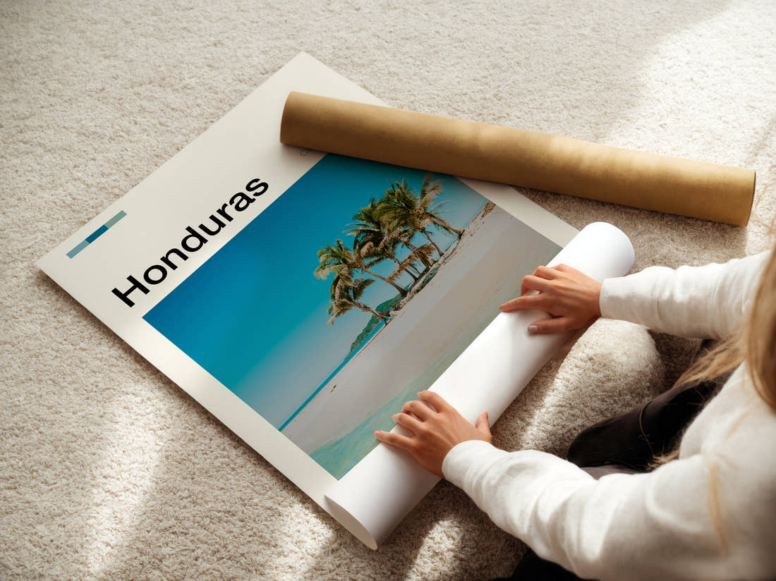 Honduras Palm Trees On The Beach Travel Print being unrolled from its postal tube