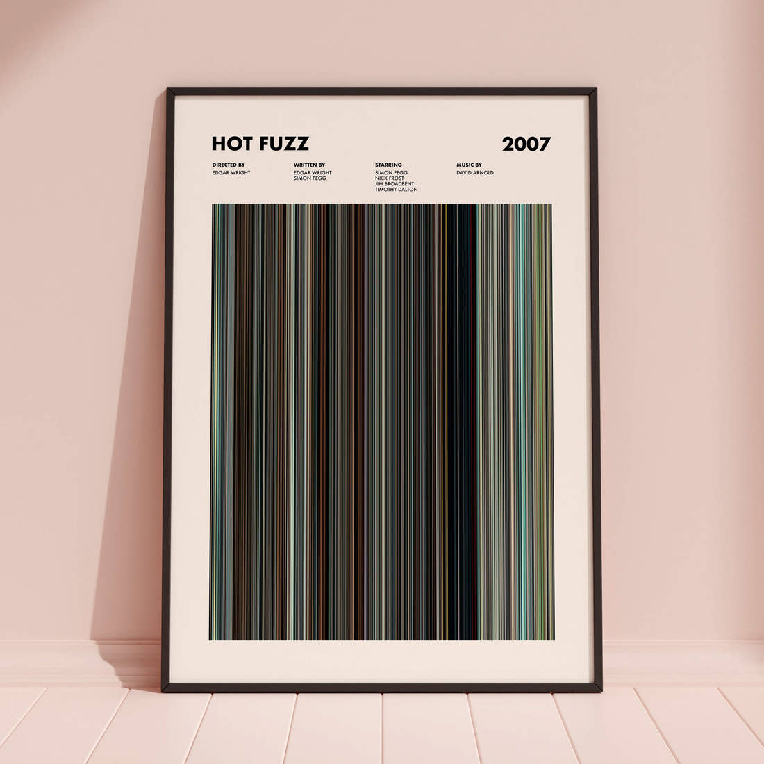 Hot Fuzz Movie Barcode Poster framed and leaning against a coloured wall