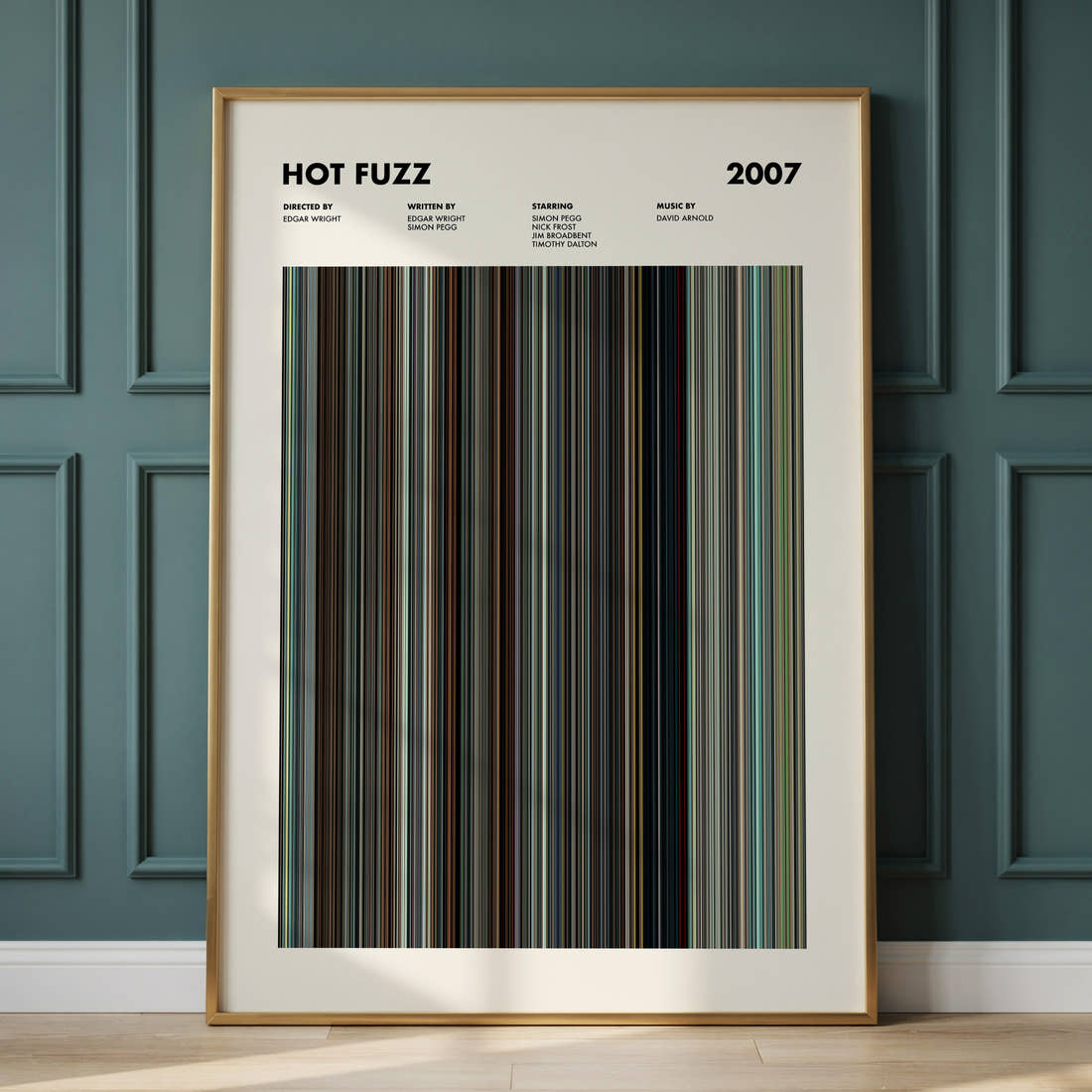 Hot Fuzz Movie Barcode Poster framed and leaning against a panelled wall