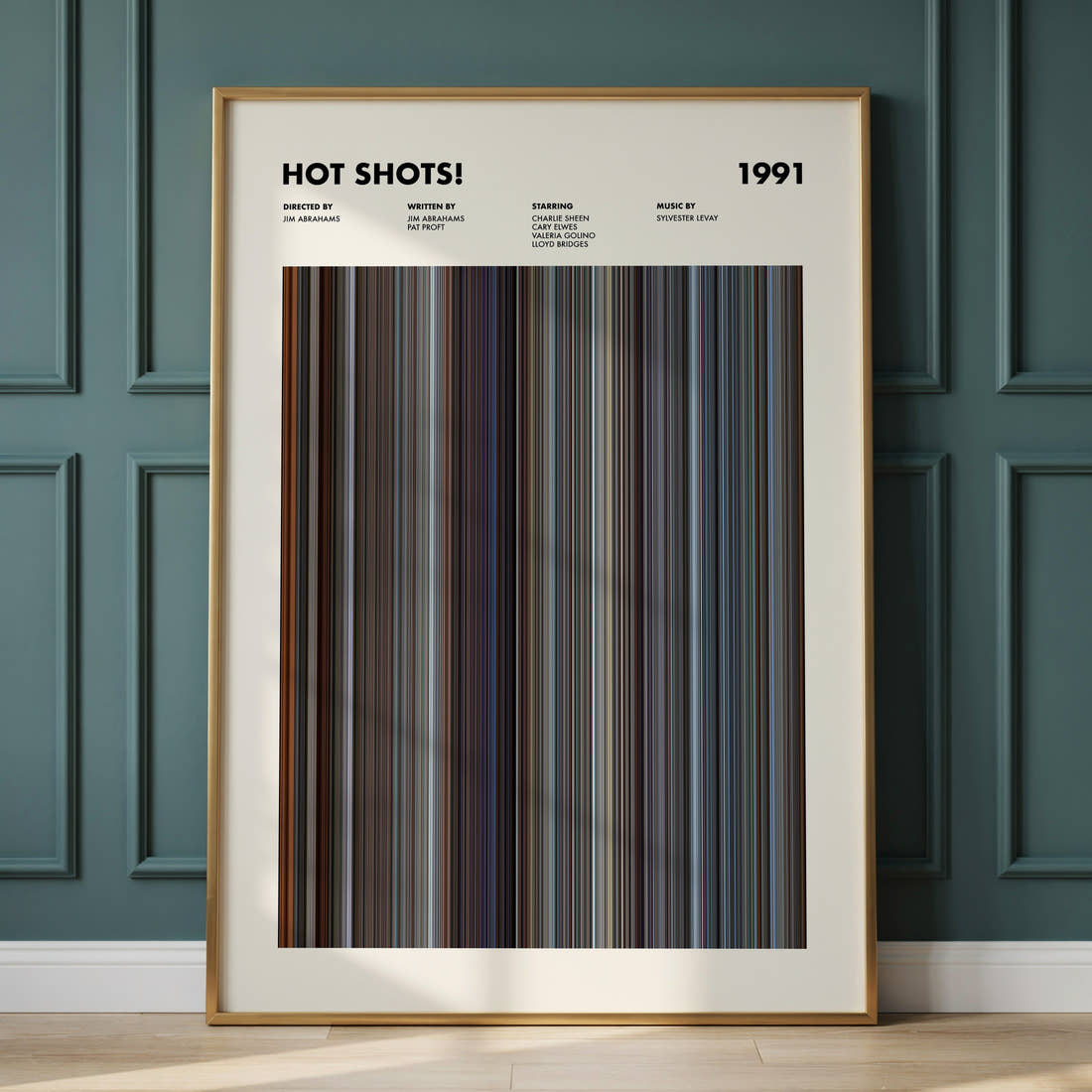 Hot Shots Movie Barcode Poster framed and leaning against a panelled wall