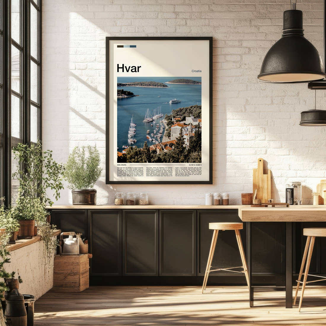 Hvar Harbour From Above Travel Print framed on the wall of a bright kitchen and dining space
