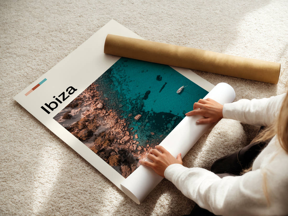 Ibiza Turquoise Cove Travel Print being unrolled from its postal tube