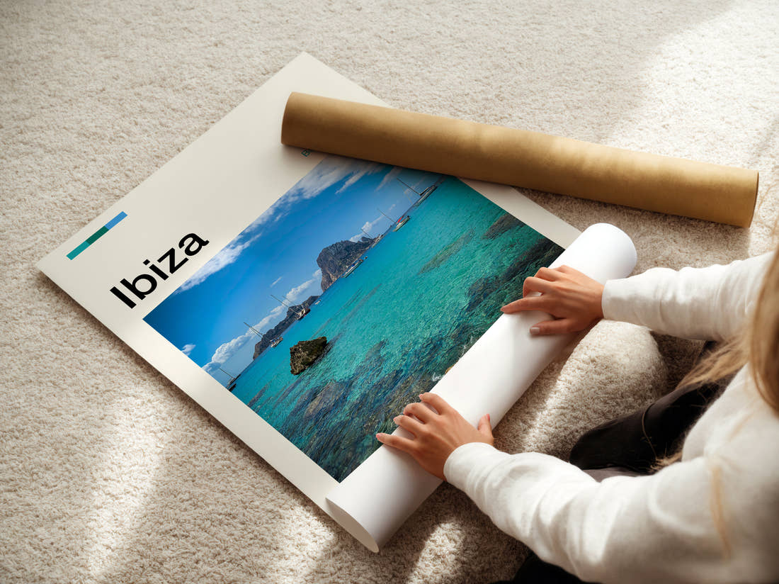 Ibiza Boats In Turquoise Bay Travel Print being unrolled from its postal tube