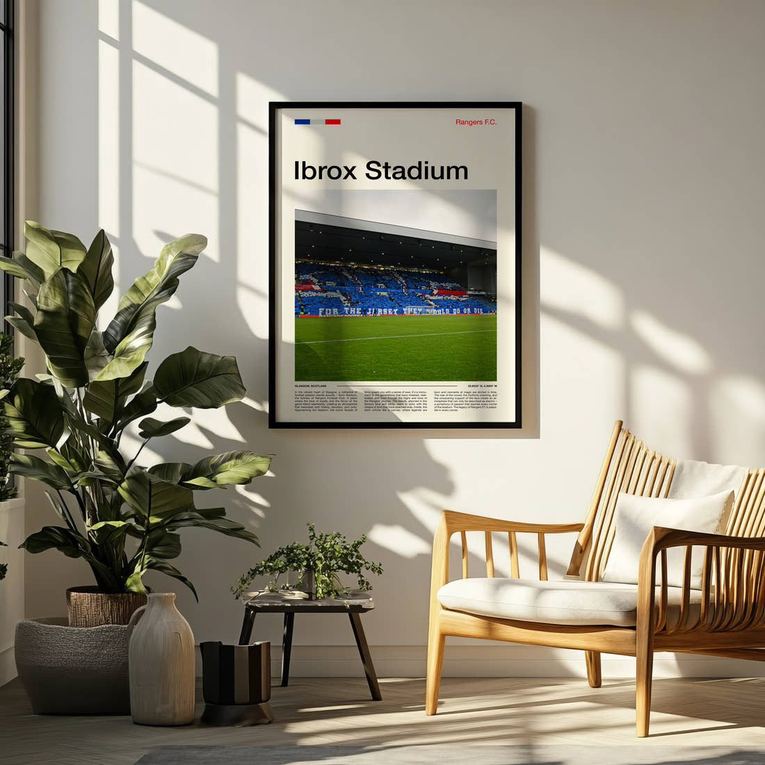 Ibrox Stadium Print framed on a pale wall beside houseplants
