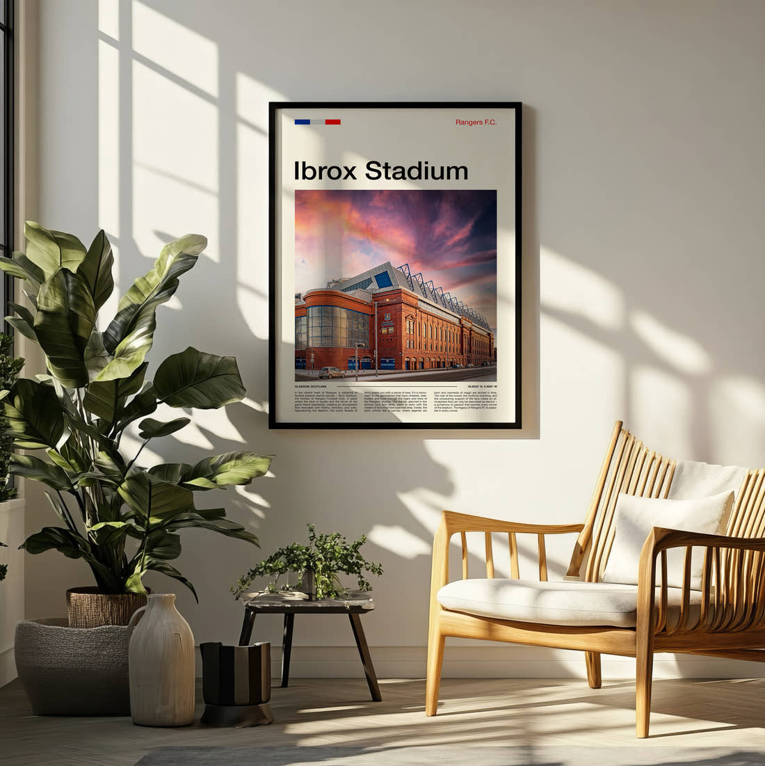 Ibrox Stadium Print framed on a pale wall beside houseplants