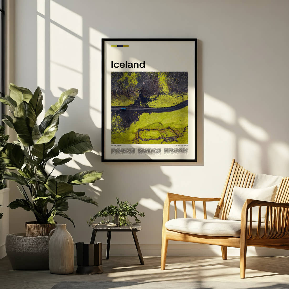 Iceland Road Through Green Moss Travel Print framed on a pale wall beside houseplants
