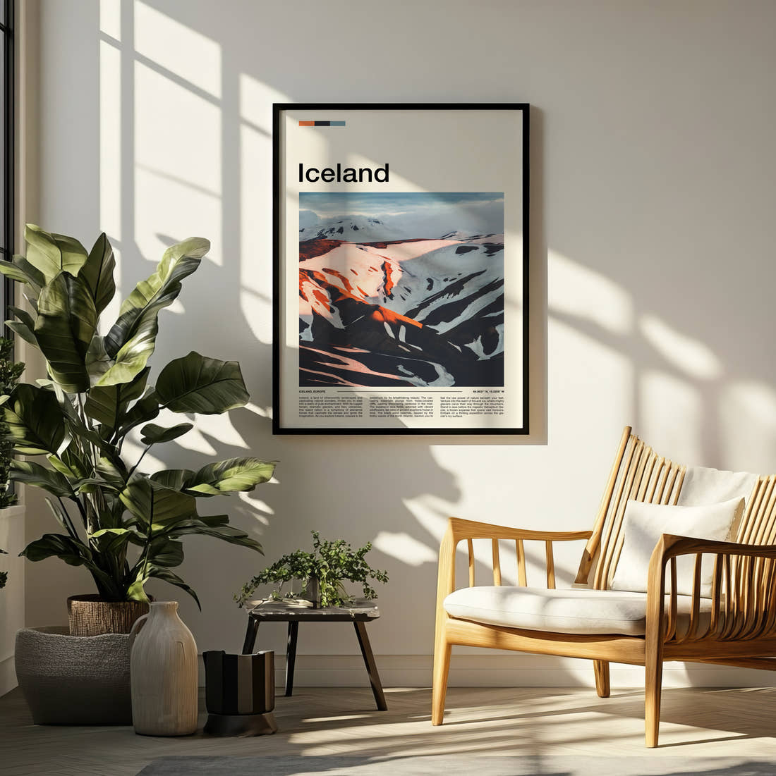 Iceland Snowy Volcanic Mountains Travel Print framed on a pale wall beside houseplants