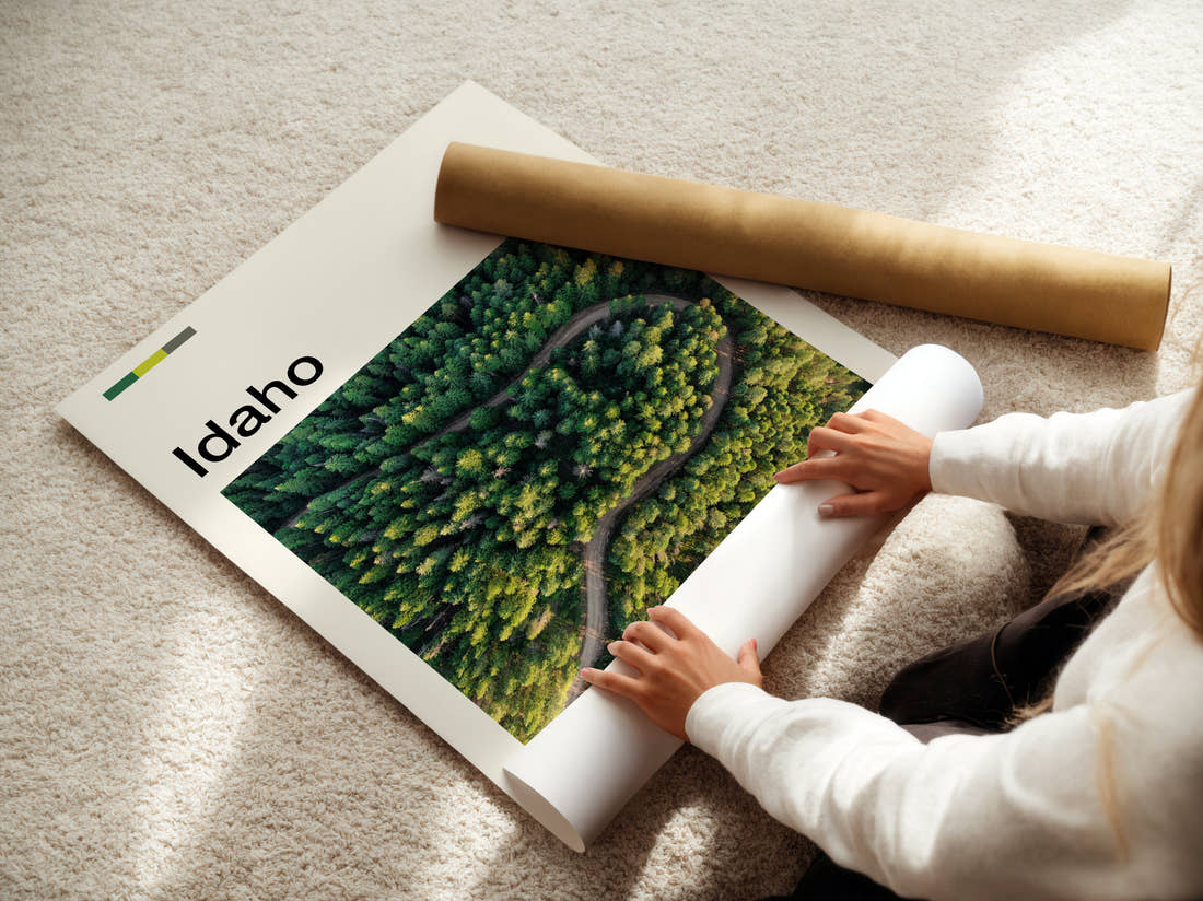 Idaho Winding Road Through Forest Travel Print being unrolled from its postal tube