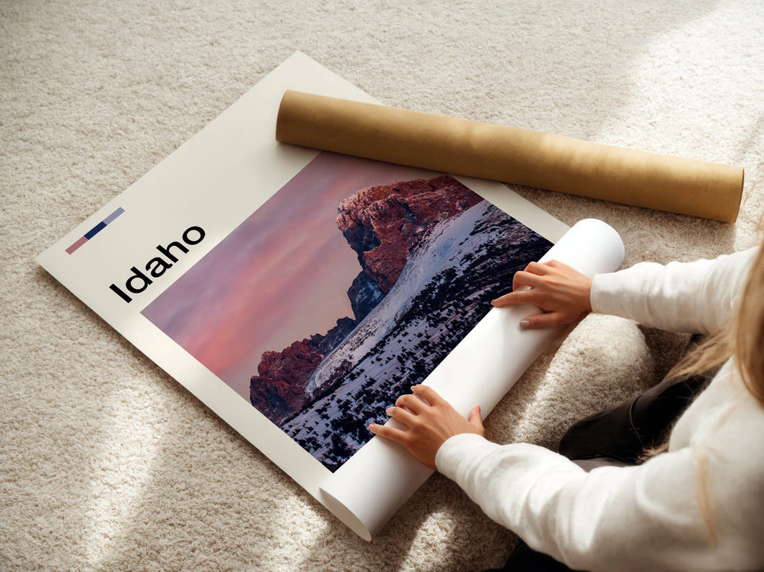 Idaho Pink Dawn Over Peaks Travel Print being unrolled from its postal tube