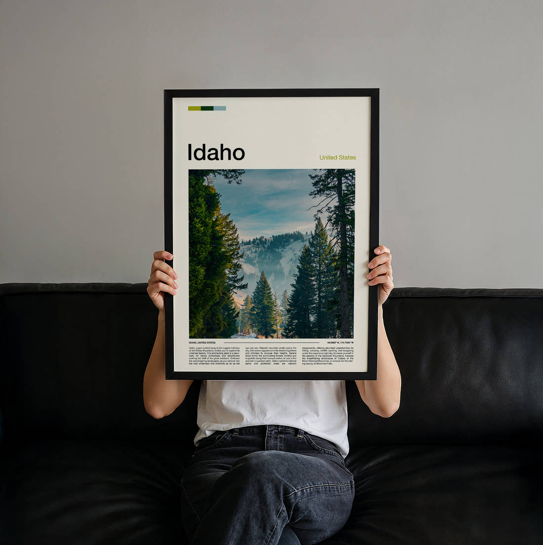 Idaho Pine Trees And Mist Travel Print held up by hand to show the size of the print