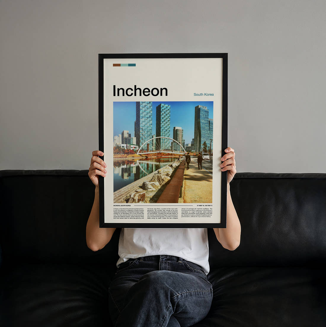 Incheon Arched Footbridge And Towers Travel Print held up by hand to show the size of the print