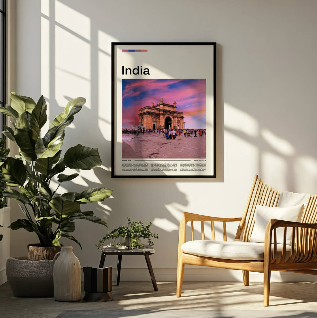 India Travel Print framed on a pale wall beside houseplants