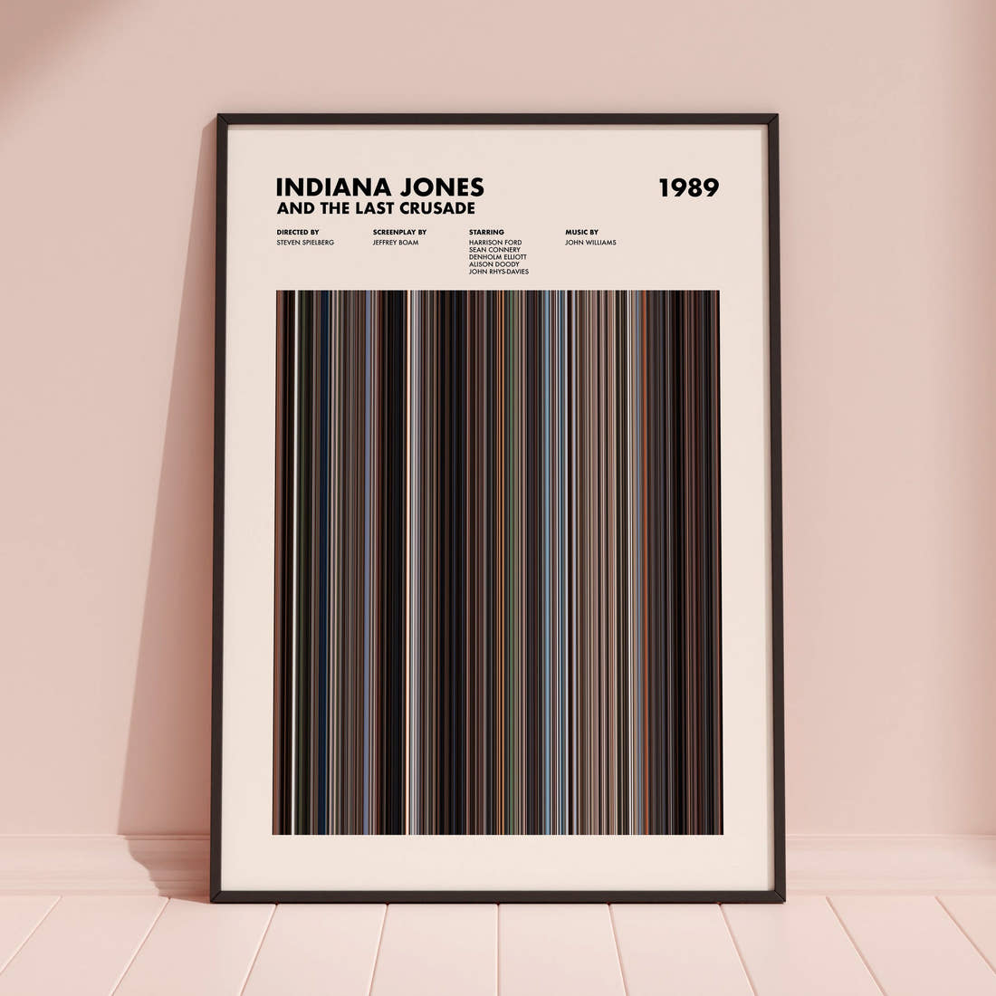 Indiana Jones and the Last Crusade Movie Barcode Poster framed and leaning against a coloured wall
