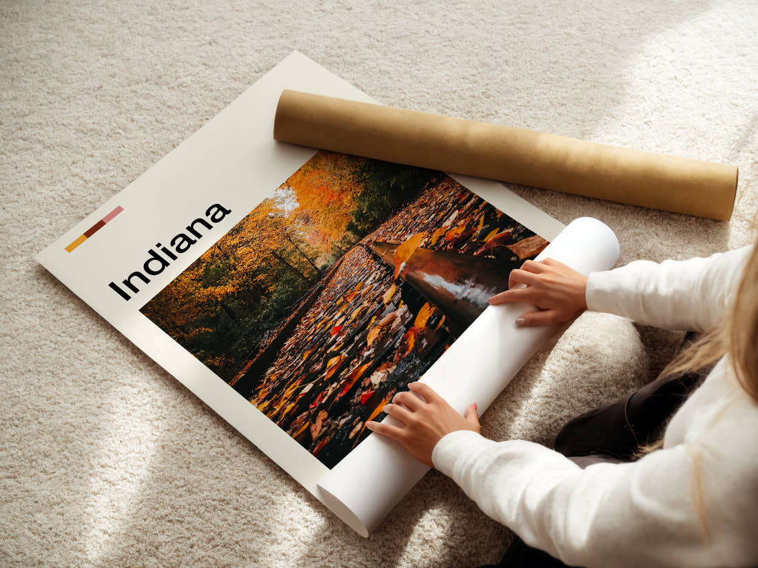 Indiana Autumn Leaves On Tracks Travel Print being unrolled from its postal tube