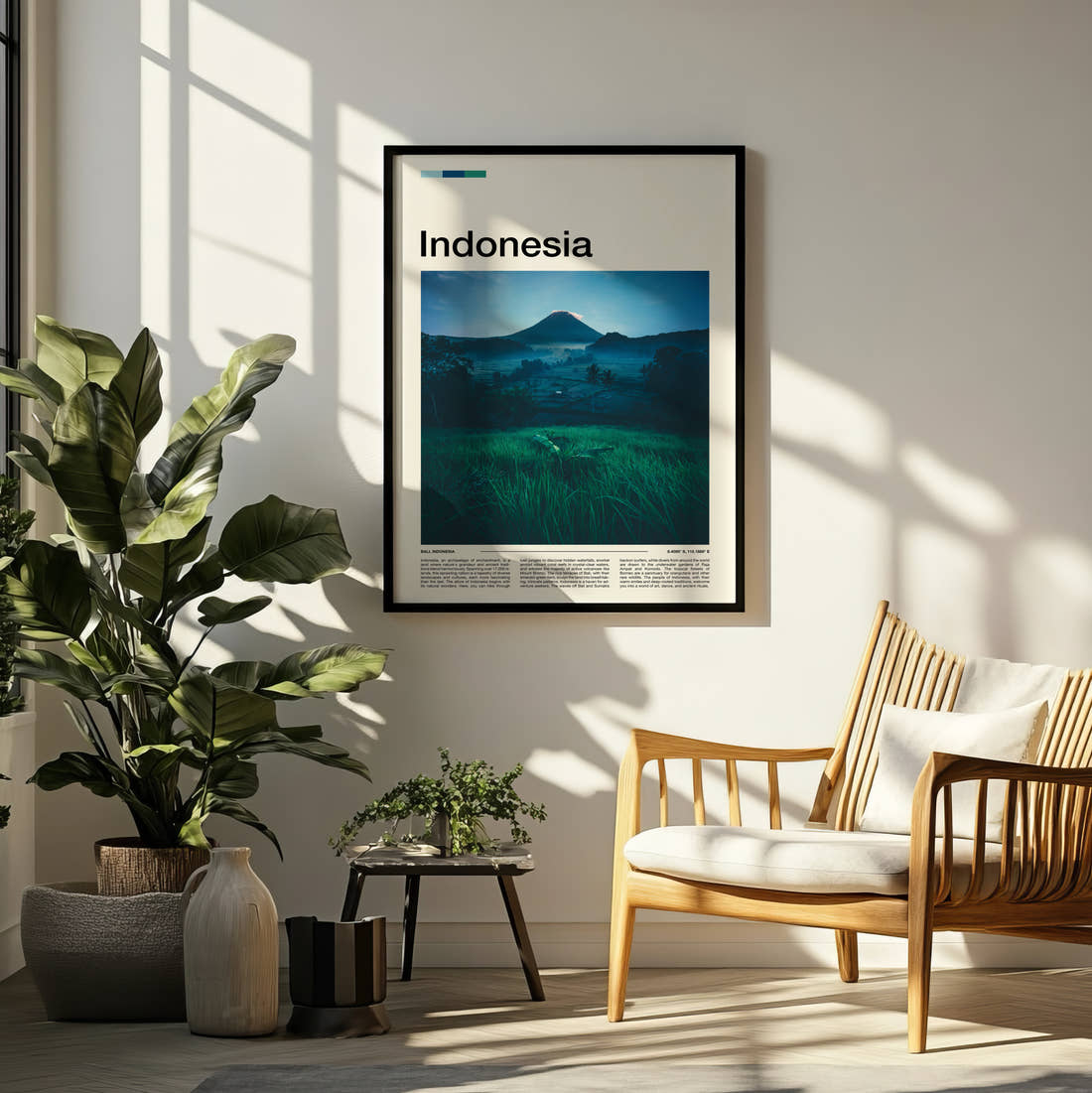 Indonesia Volcano At Dusk Travel Print framed on a pale wall beside houseplants