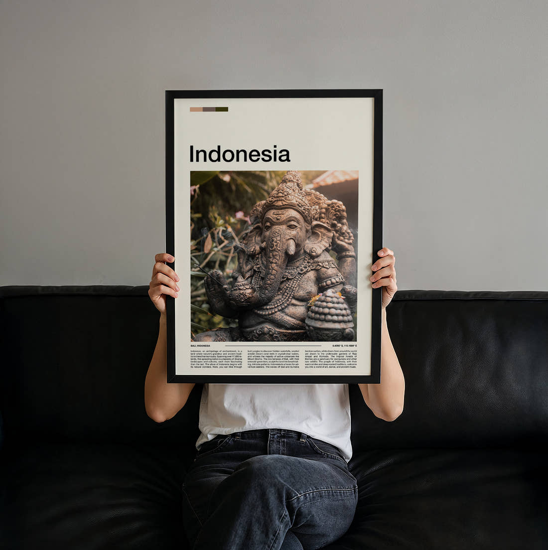 Indonesia Ganesha Statue Travel Print held up by hand to show the size of the print