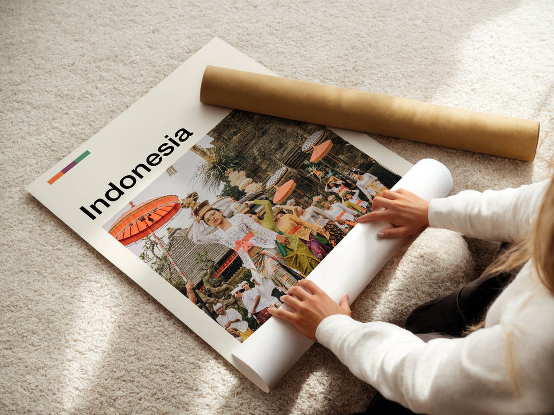 Indonesia Traditional Dress Ceremony Travel Print being unrolled from its postal tube