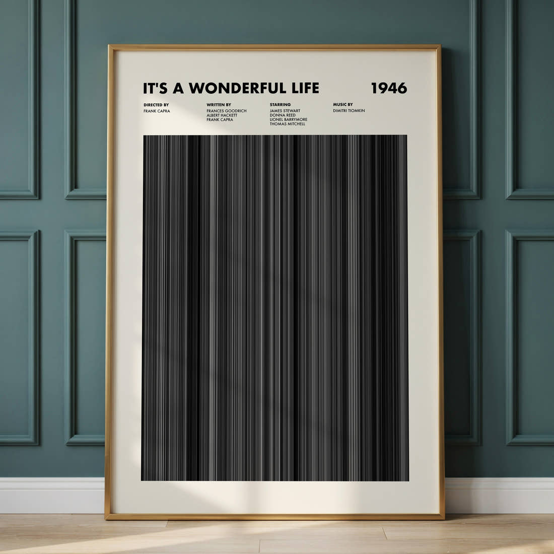 It's A Wonderful Life Movie Barcode Poster framed and leaning against a panelled wall