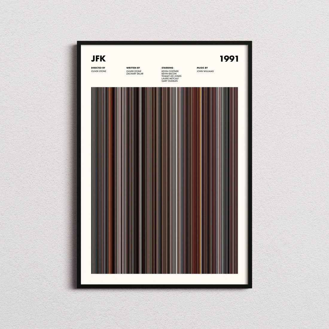 JFK Movie Barcode Poster framed on a plain studio wall