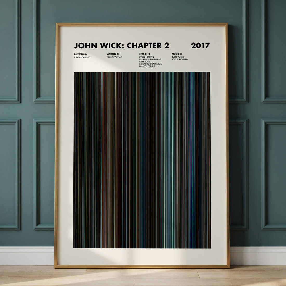 John Wick Chapter 2 Movie Barcode Poster framed and leaning against a panelled wall