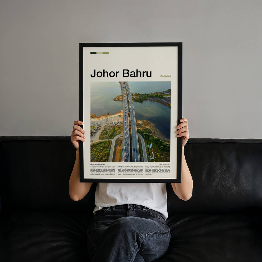 Johor Bahru Aerial Causeway View Travel Print held up by hand to show the size of the print