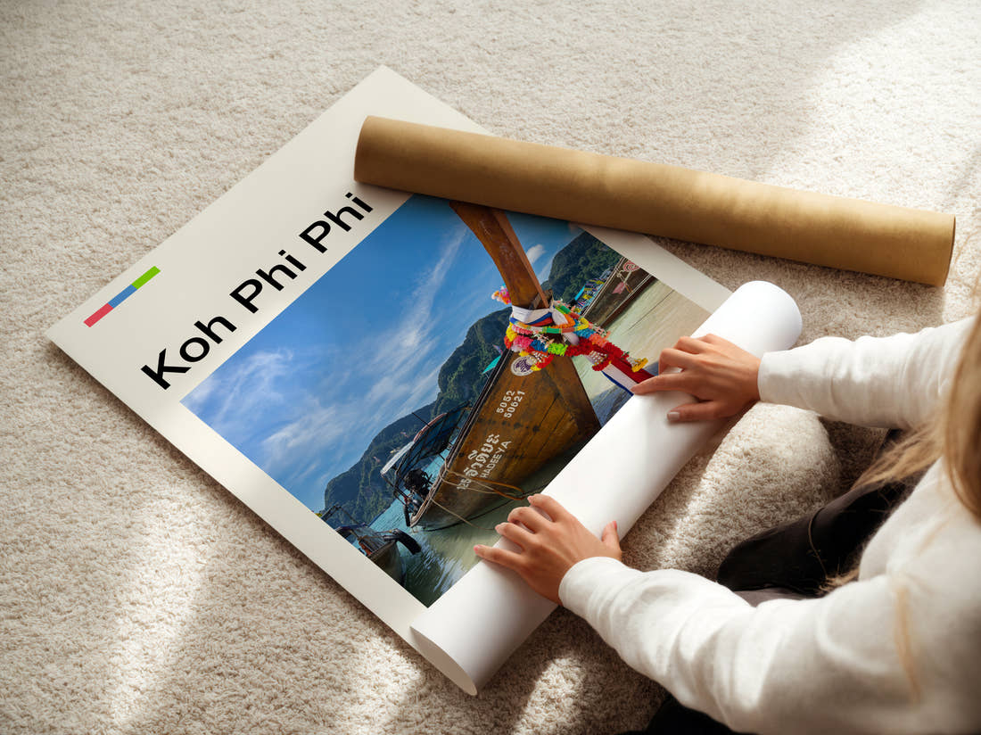 Koh Phi Phi Longtail Boat Travel Print being unrolled from its postal tube