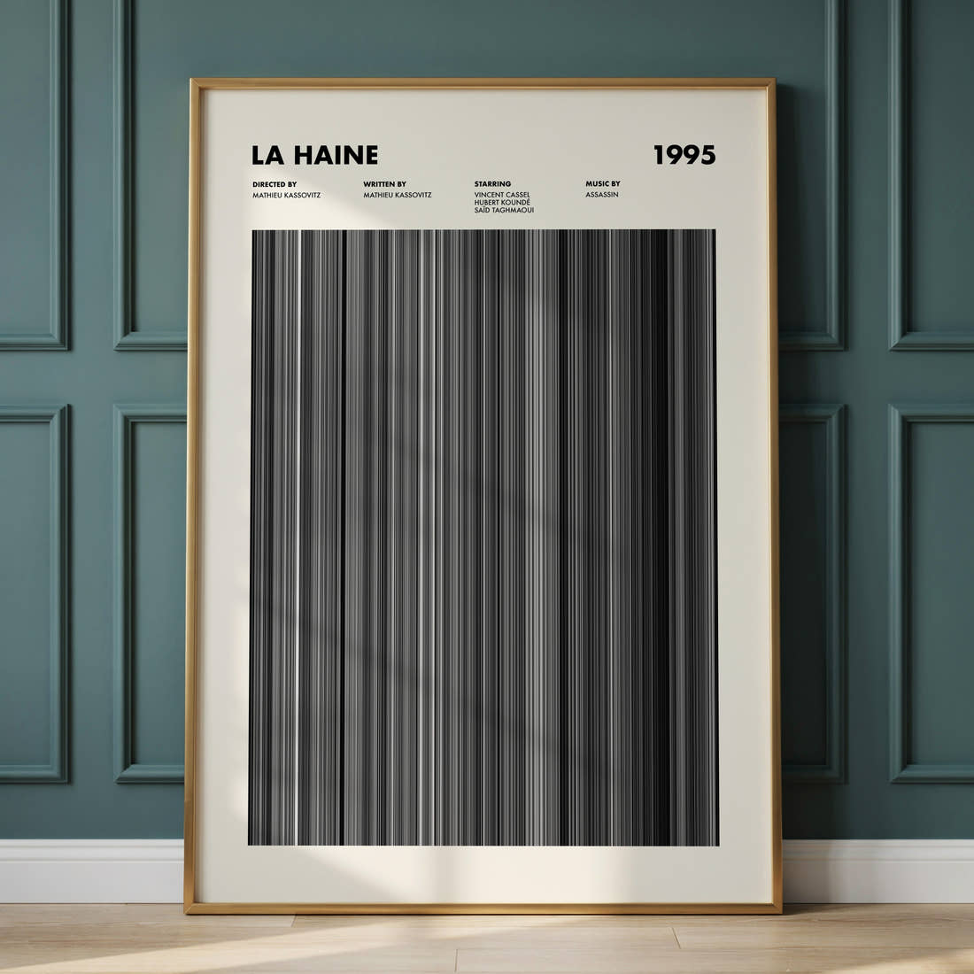 La Haine Movie Barcode Poster framed and leaning against a panelled wall