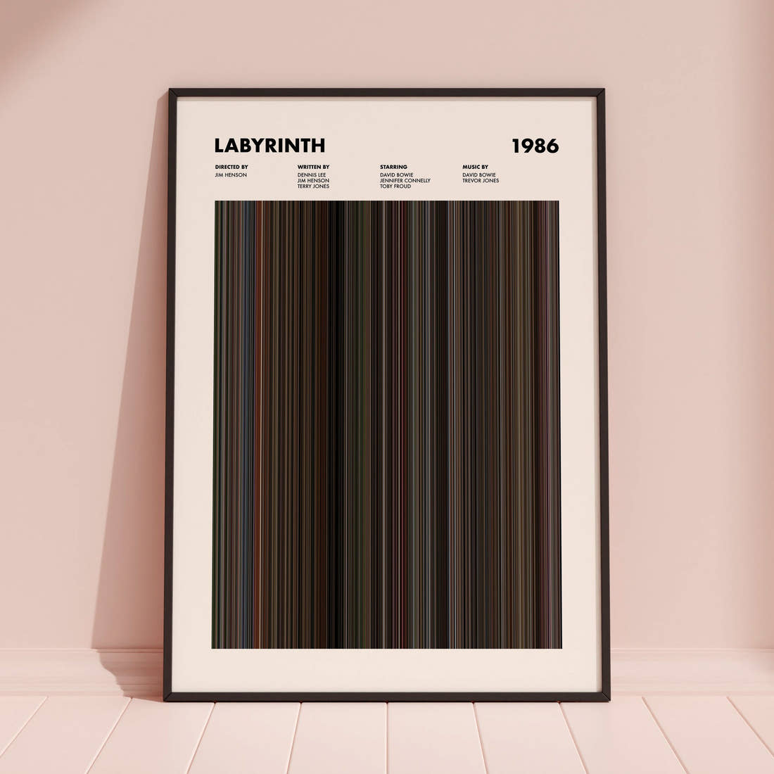 Labyrinth Movie Barcode Poster framed and leaning against a coloured wall