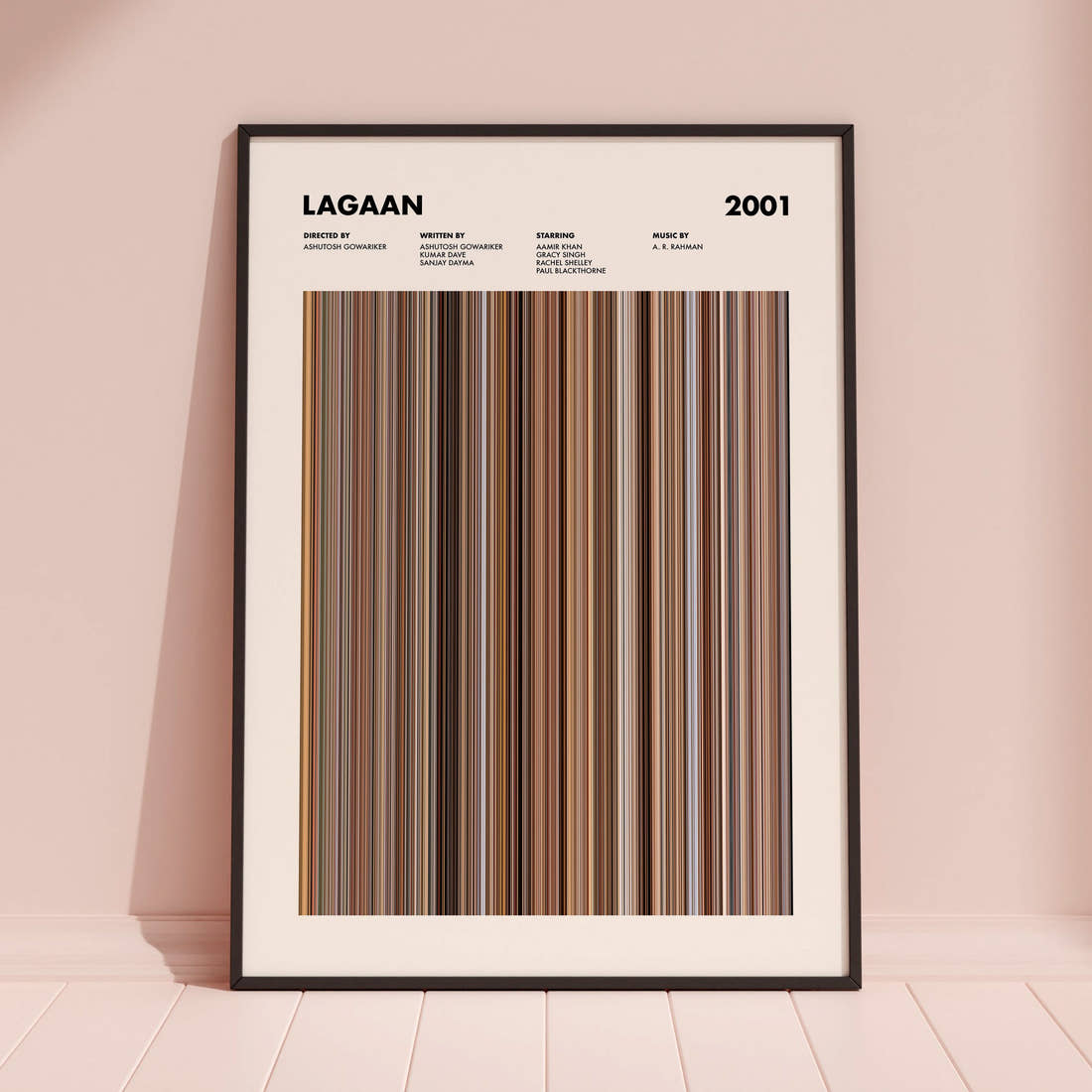 Lagaan Movie Barcode Poster framed and leaning against a coloured wall