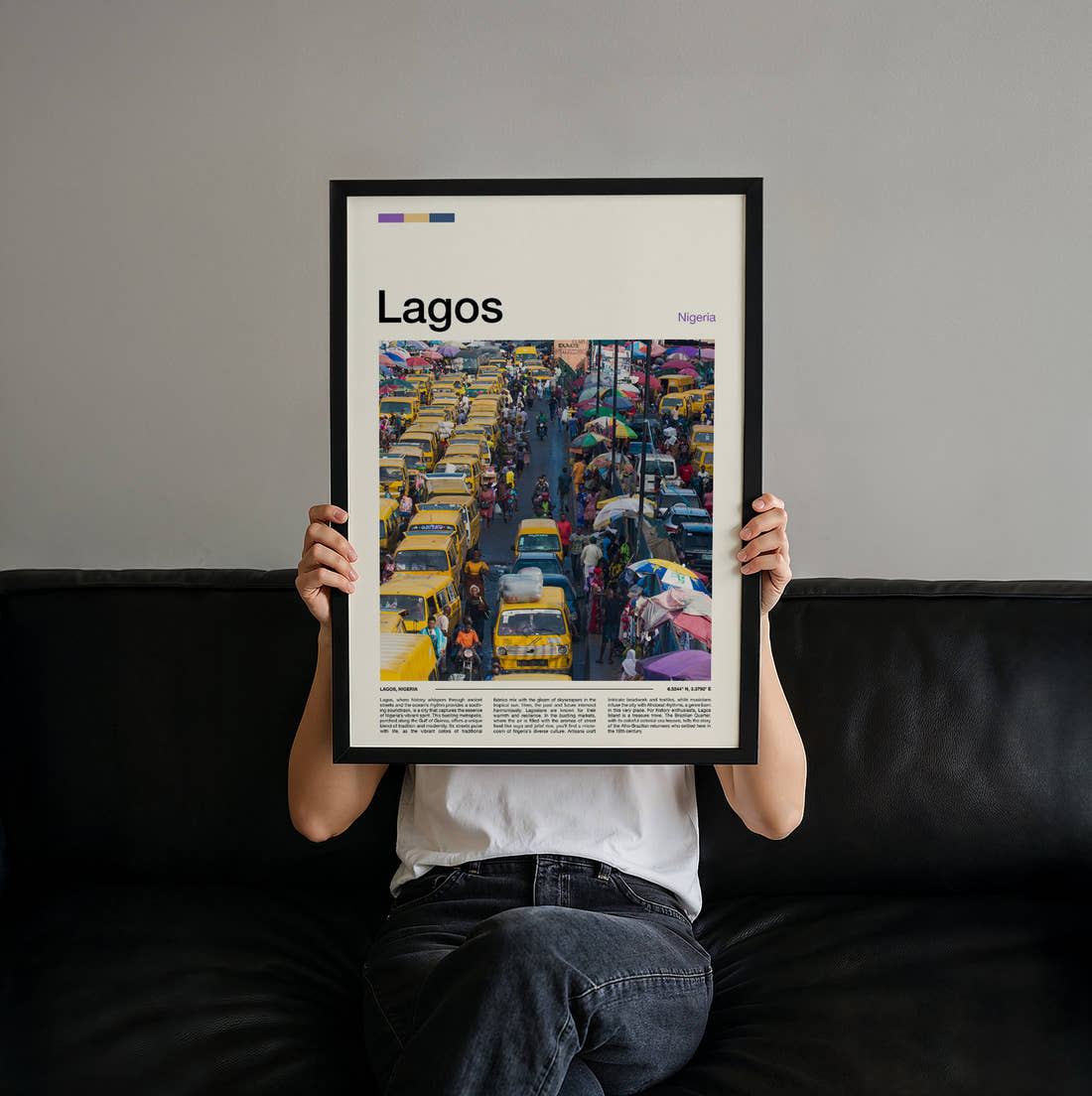 Lagos Yellow Buses In Traffic Travel Print held up by hand to show the size of the print