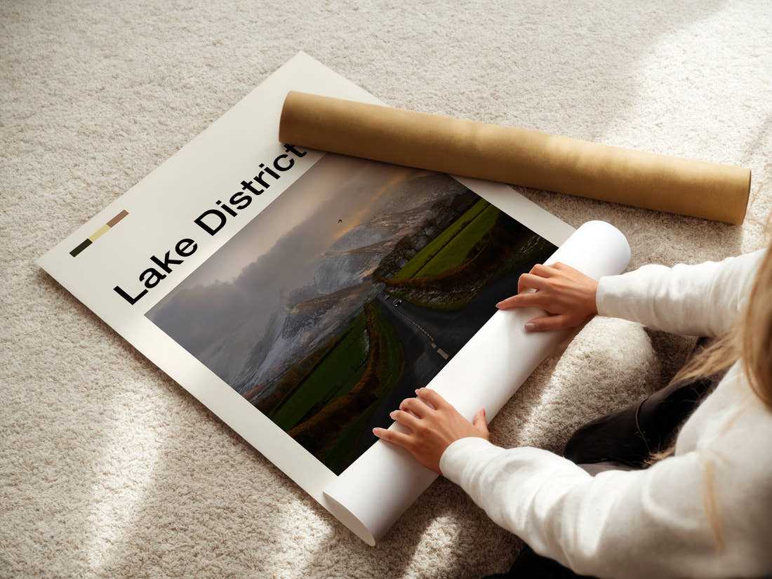 Lake District Fell Road At Dusk Travel Print being unrolled from its postal tube