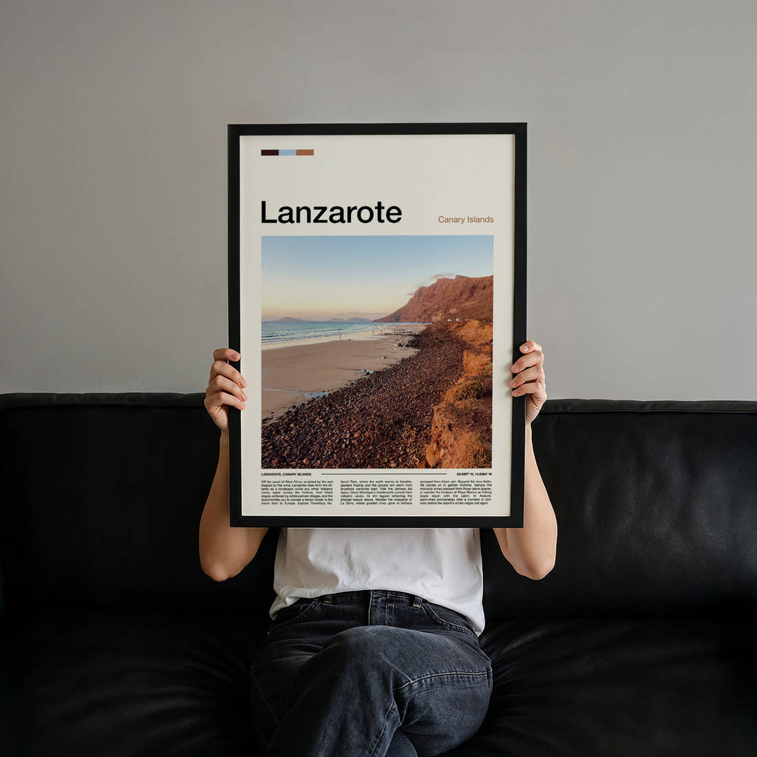 Lanzarote Volcanic Coastal Cliffs Travel Print held up by hand to show the size of the print
