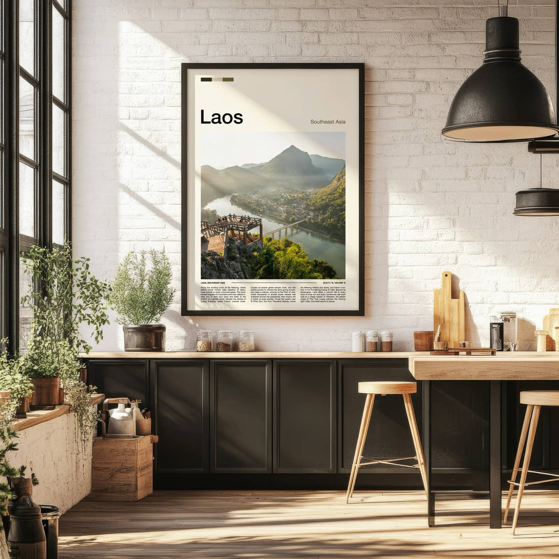 Laos River Valley Viewpoint Travel Print framed on the wall of a bright kitchen and dining space