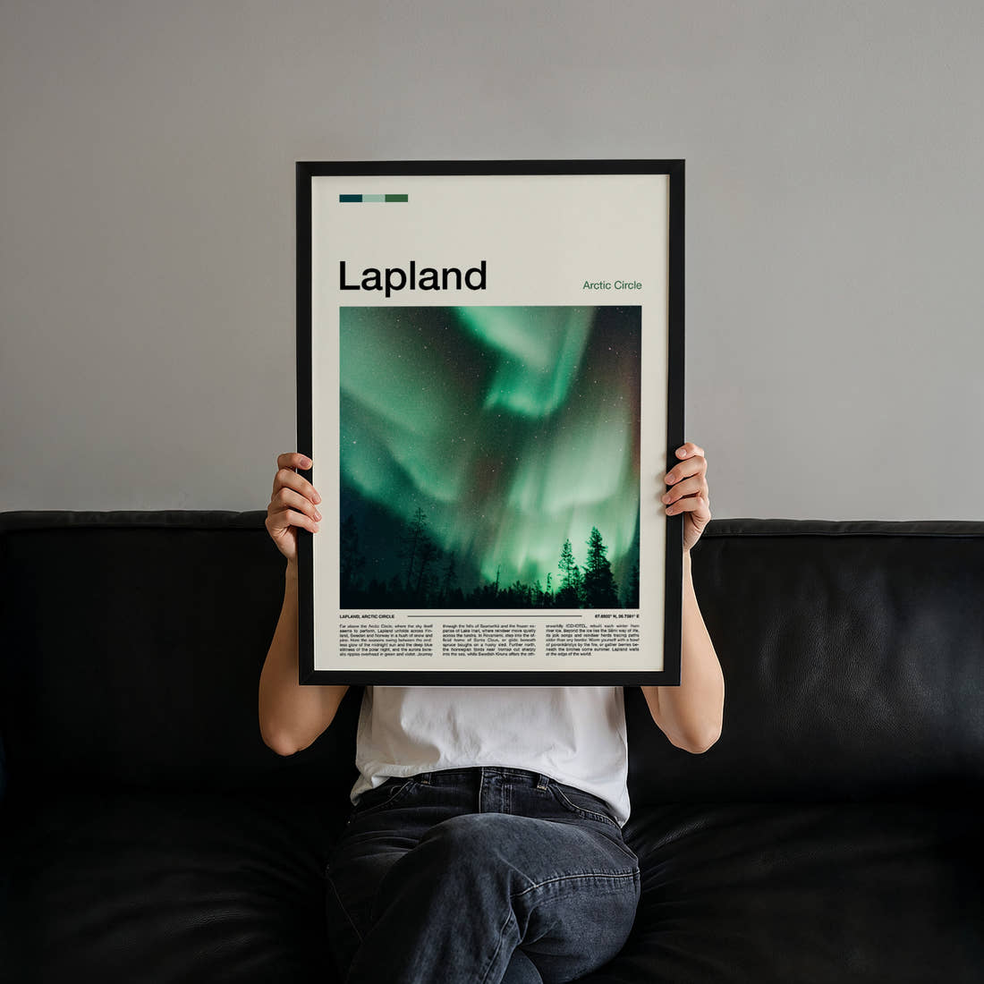 Lapland Aurora Borealis Sky Travel Print held up by hand to show the size of the print