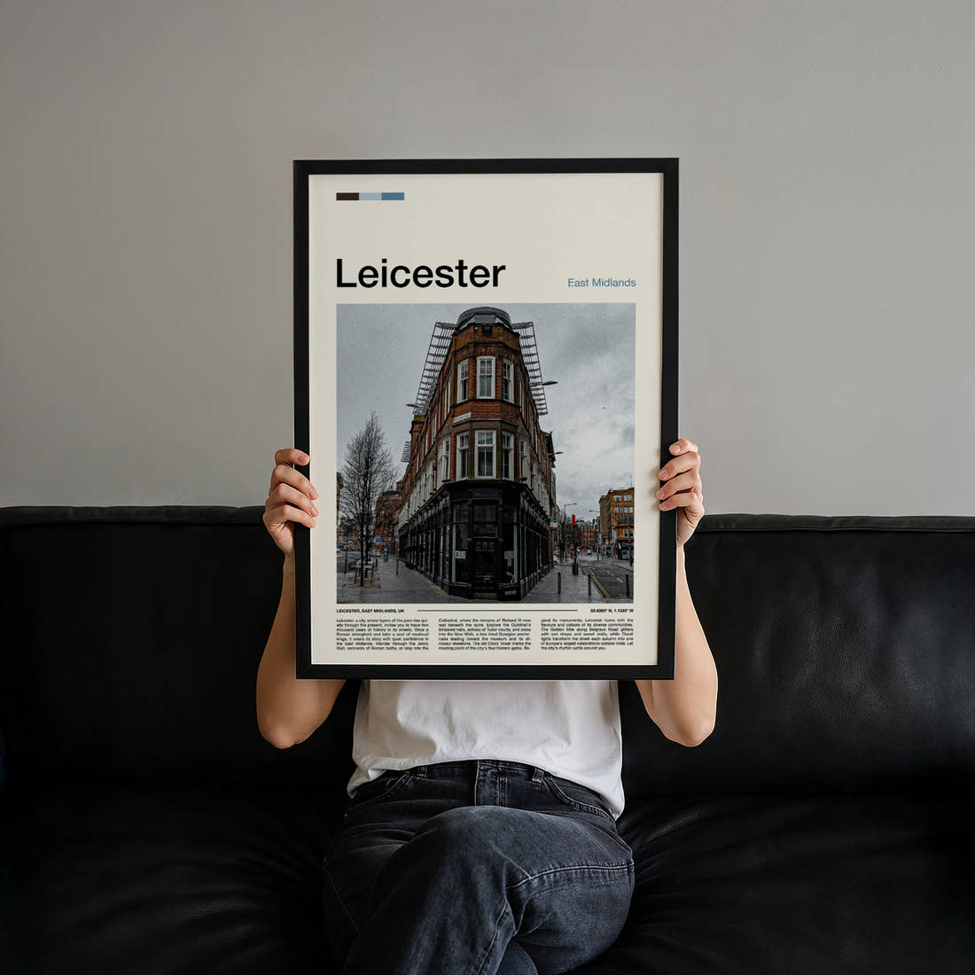 Leicester Corner Building Junction Travel Print held up by hand to show the size of the print