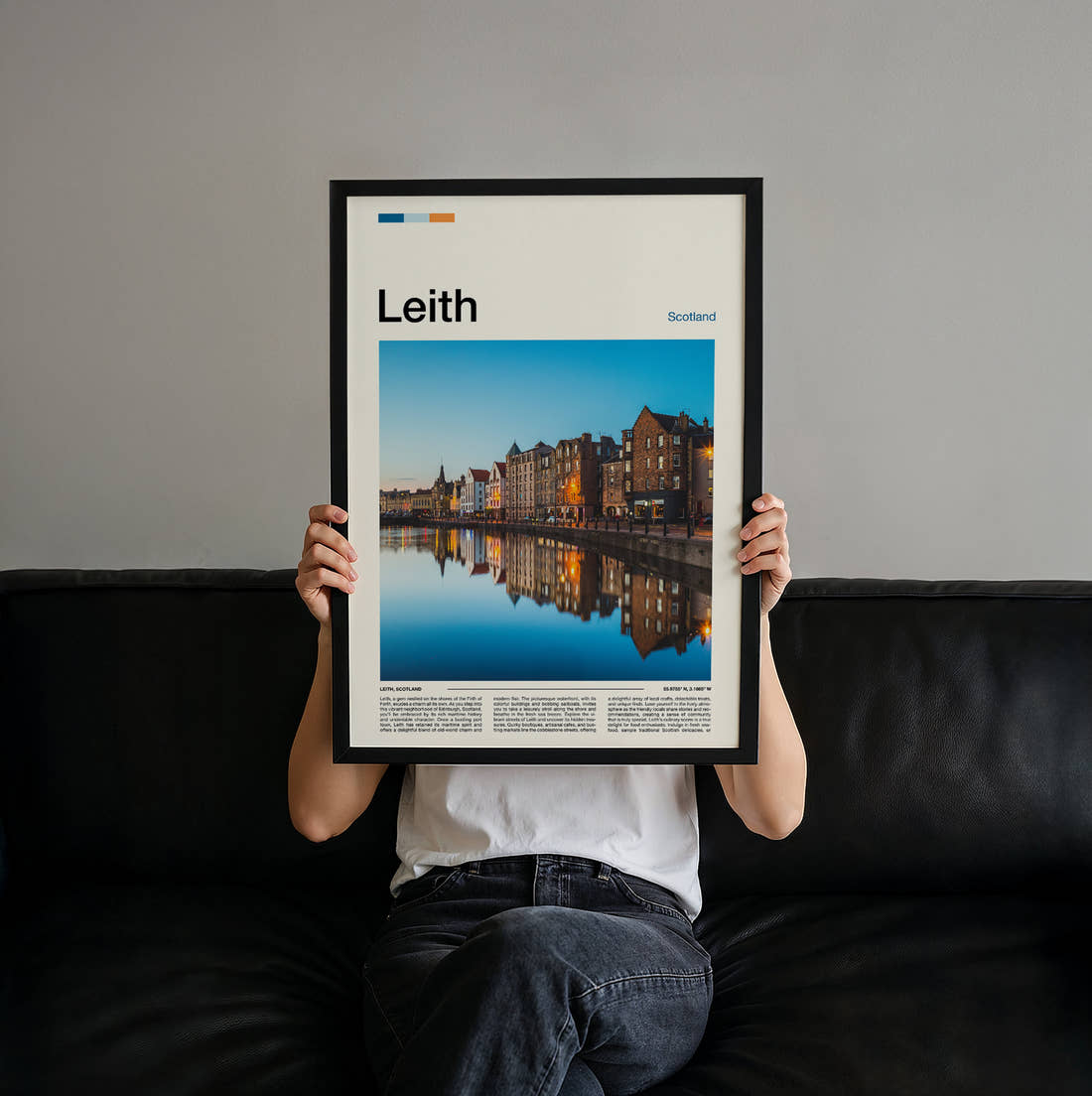 Leith Waterfront Buildings Reflected Travel Print held up by hand to show the size of the print