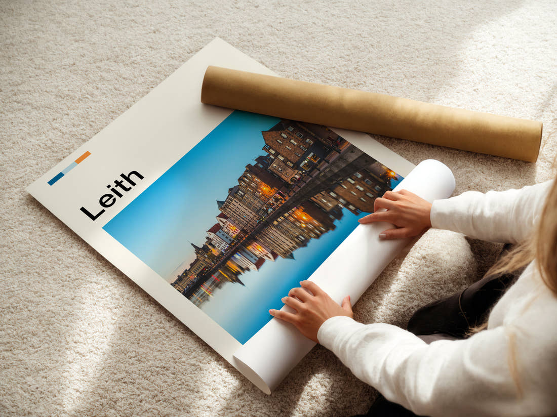 Leith Waterfront Buildings Reflected Travel Print being unrolled from its postal tube