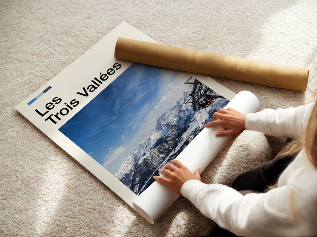 Les Trois Vallees Ski Lift Over Snow Travel Print being unrolled from its postal tube