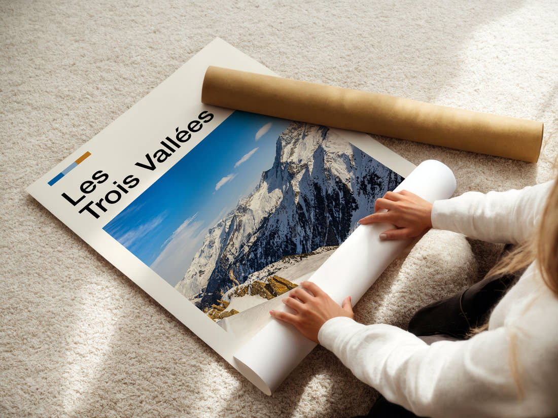 Les Trois Vallees Snowy Mountain Peaks Travel Print being unrolled from its postal tube